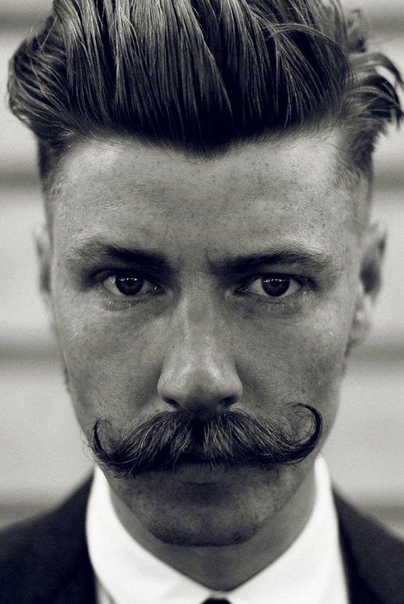 Fashion During the 1920s hair was a big deal for men Mustaches were the style du.jpg